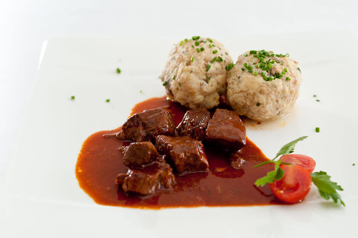 South Tyrolean dumplings with goulash - Hotel Gasthof zur Sonne