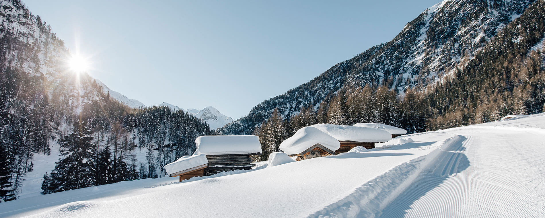 Rifugi innevati sulla pista da sci di fondo in Alto Adige - Hotel Gasthof zur Sonne